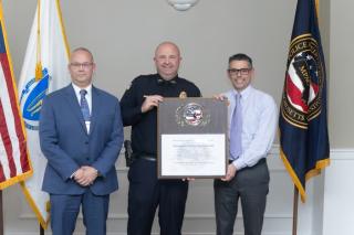 Picture of presentation of Accreditation Plaque